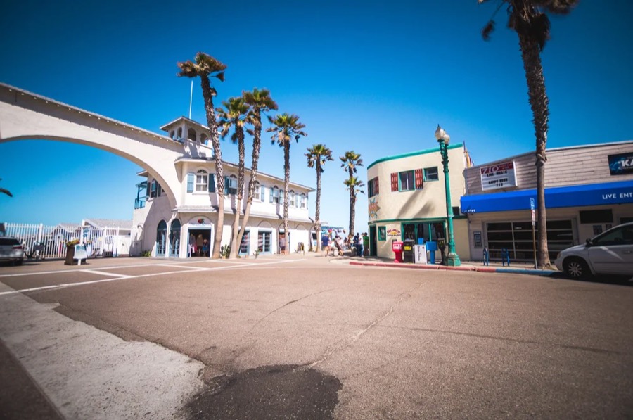 The Crystal Pier archway on Ocean Front Walk, across from Kono's Cafe