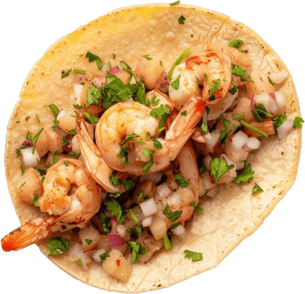 A shrimp taco with pico de gallo on a flour tortilla at Oscar's Mexican Seafood