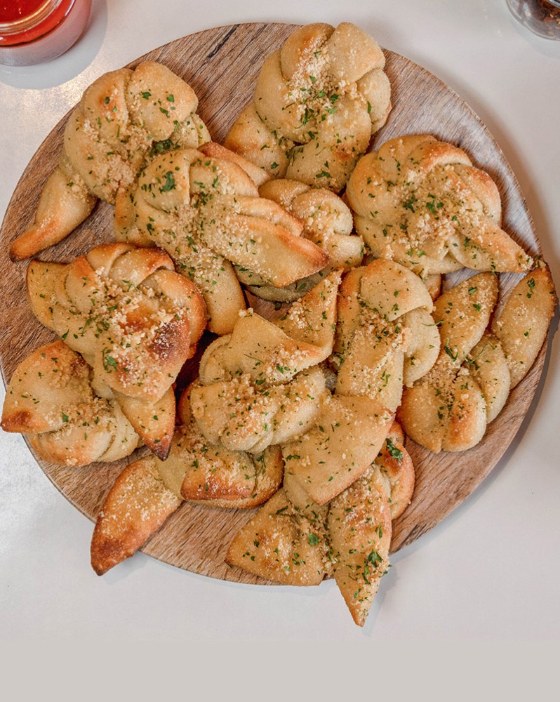 A tray of garlic knots from Theo's Hot Pizza